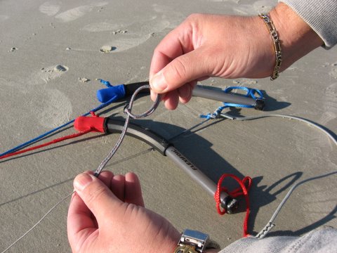 tutorial photo 3 of forming a loop with thumb and forefinger for a larks head knot